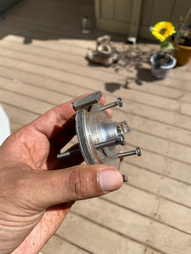 Figure 3: Lower burr carrier of a Superjolly sits so tight that it needs to be popped out by alternately tightening three long M6 screws